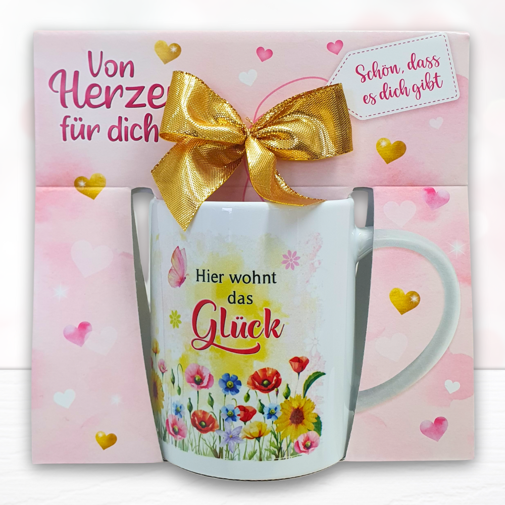Kaffeetasse - Hier wohnt das Glück - Keramik Tasse mit Geschenkverpackung zum Geburtstag Muttertag Beidseitig mit rosa und roten Herzen bedruckt