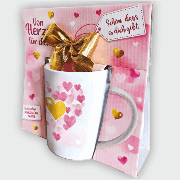 Süße Kaffeetasse - großes Herz - Porzellan Tasse und Schokolade mit Geschenkverpackung zum Geburtstag Muttertag Beidseitig mit rosa und roten Herzen bedruckt - schräg