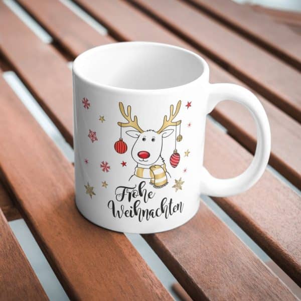Süße Weihnachtstasse - Rentier - Kaffeetasse und Schokolade mit Geschenkverpackung zu Weihnachten. Beidseitig mit Gold bedruckt - Auf Tisch